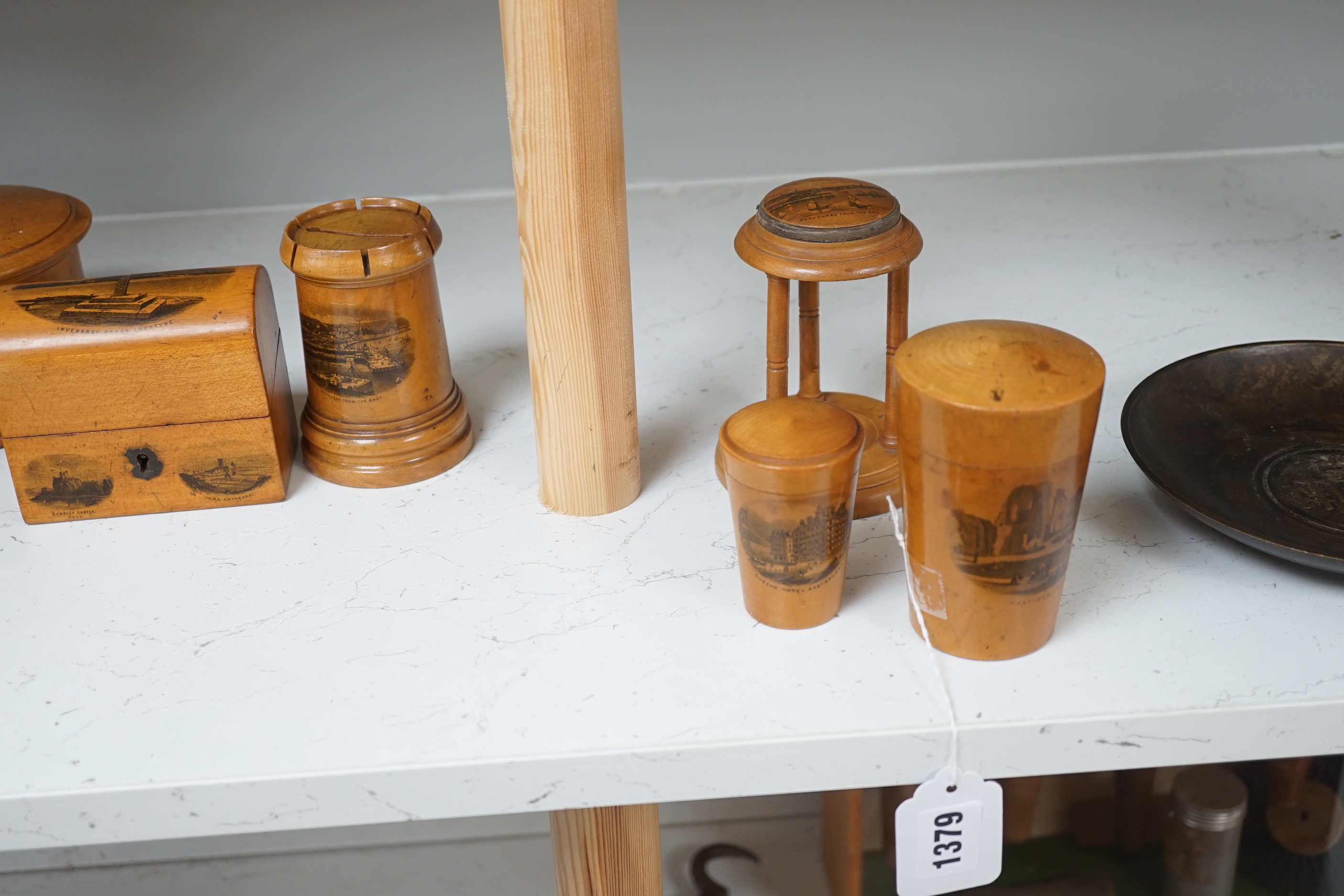 Sixteen mixed Mauchline ware boxes, pin cushions, pots, and a frame etc, tallest 13.5cm high